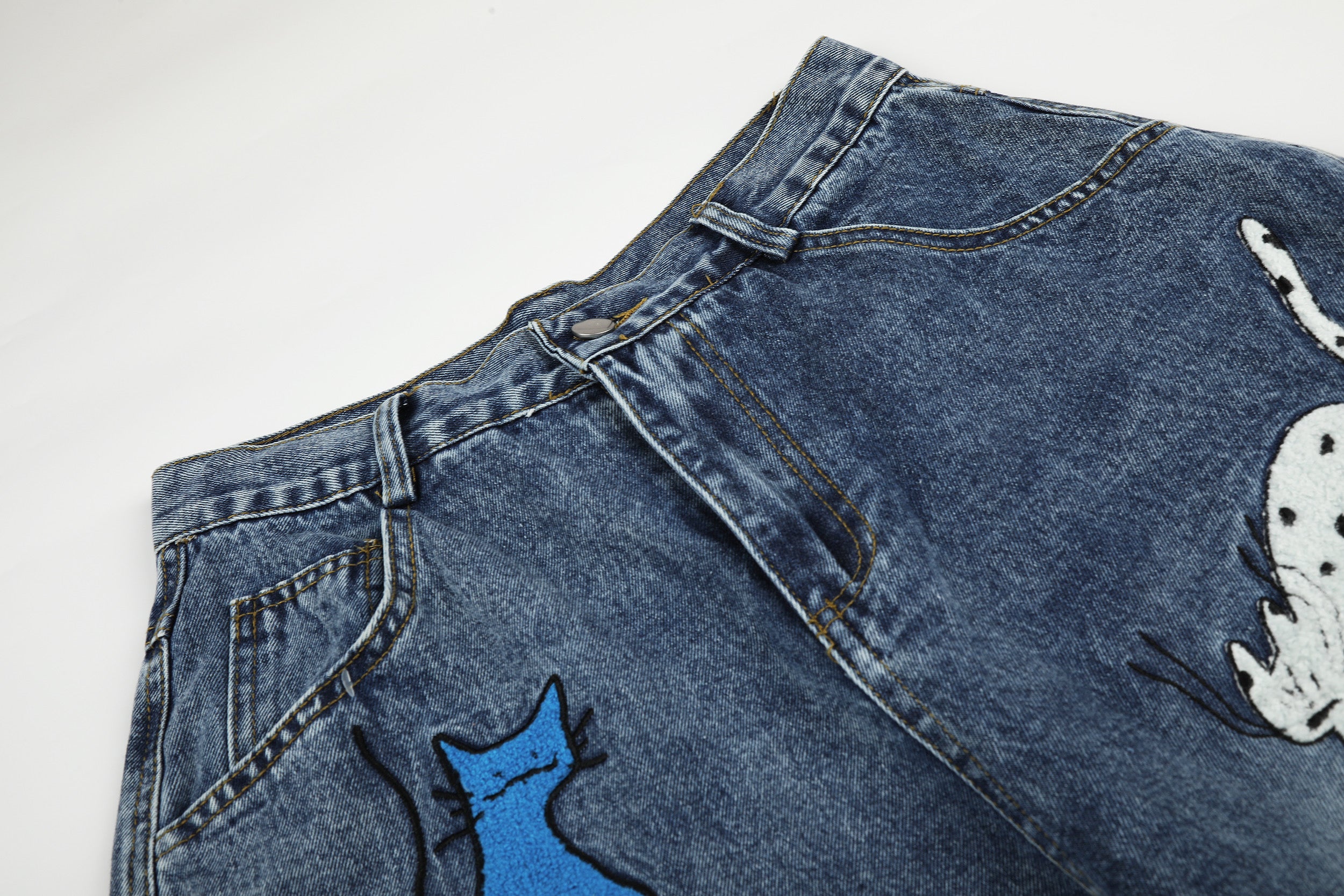 DONOTLOGO Urban Feline Art Collection | Unisex Relaxed Fit Denim Cropped Pants | Playful Multi-Color Cat & Text Embroidery Detail with Vintage Wash Finish