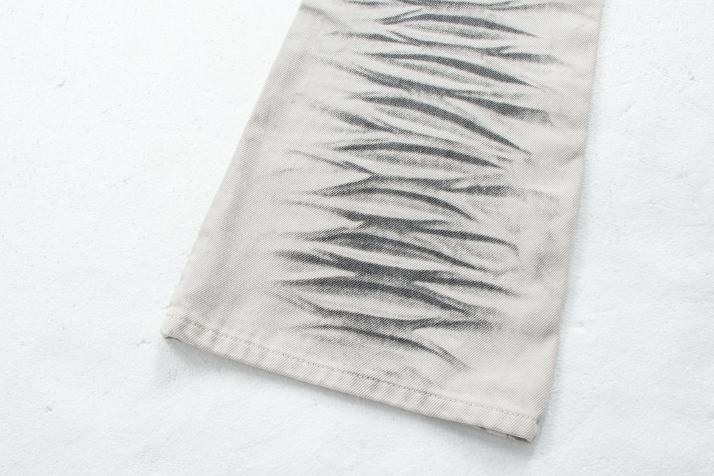 Dirty-Wash Distressed Micro-Flare Denim Jeans