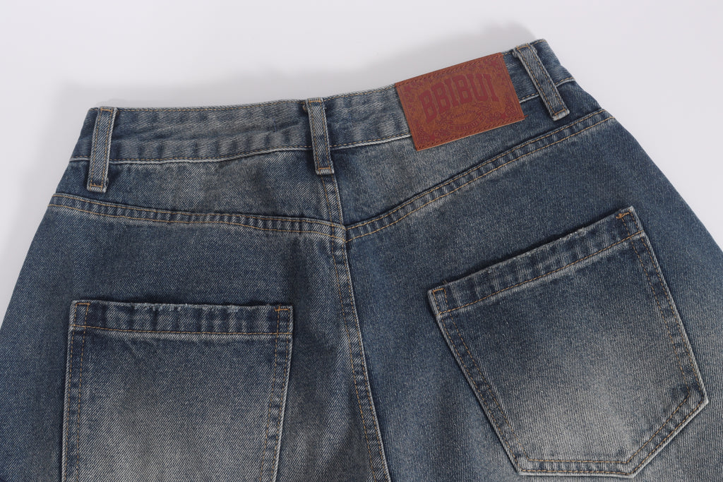 DONOTLOGO Retro Grunge Aesthetic | Unisex Baggy Star-Embellished Denim Trousers | Distressed Wash with Raw Edge Patches & Leather Brand Tag