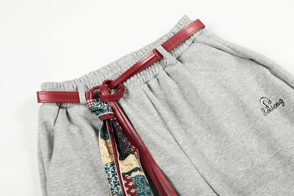 DONOTLOGO Urban Streetwear Collection | Unisex Relaxed Silhouette Sweatpants | Bold Patchwork Scarf Motif & Soft Cotton Knit Fabric