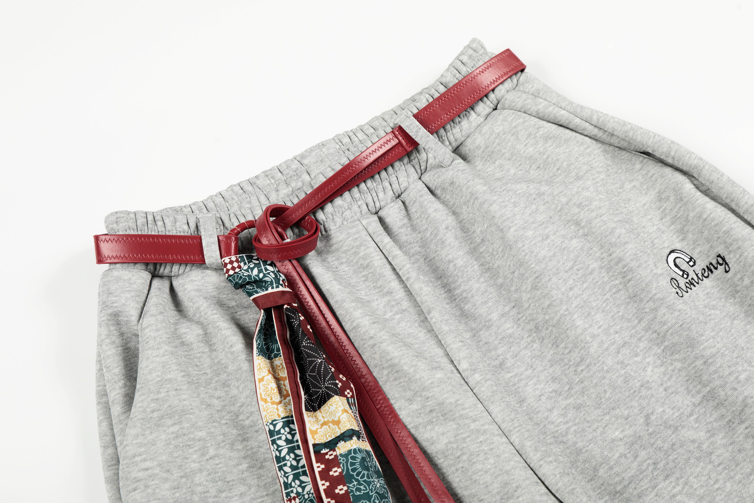 DONOTLOGO Urban Streetwear Collection | Unisex Relaxed Silhouette Sweatpants | Bold Patchwork Scarf Motif & Soft Cotton Knit Fabric