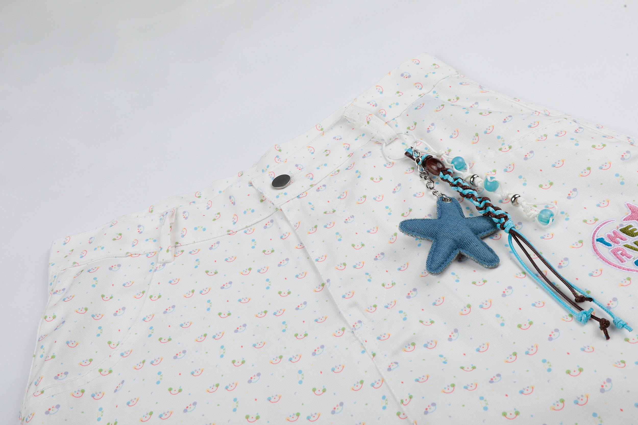 DONOTLOGO Whimsical Garden Collection | Unisex Relaxed Fit Cotton Cropped Pants | Playful Micro-Floral Print with Detachable Star Pendant Detail