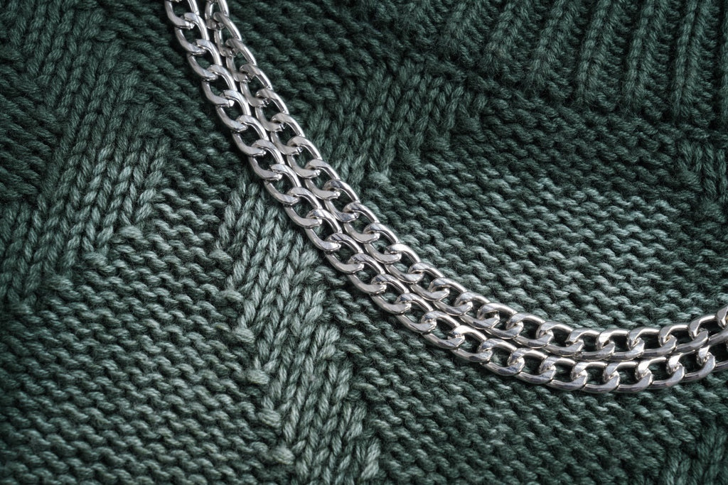 Unisex Crewneck Sweater with Irregular Paint and Chain Detail