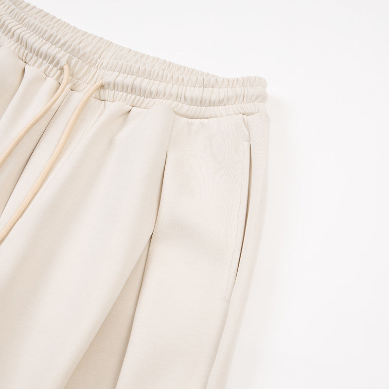 DONOTLOGO Urban Streetwear Collection | Unisex Curved Silhouette Trousers | Bold Pleat Motif & Soft Cotton Blend Fabric