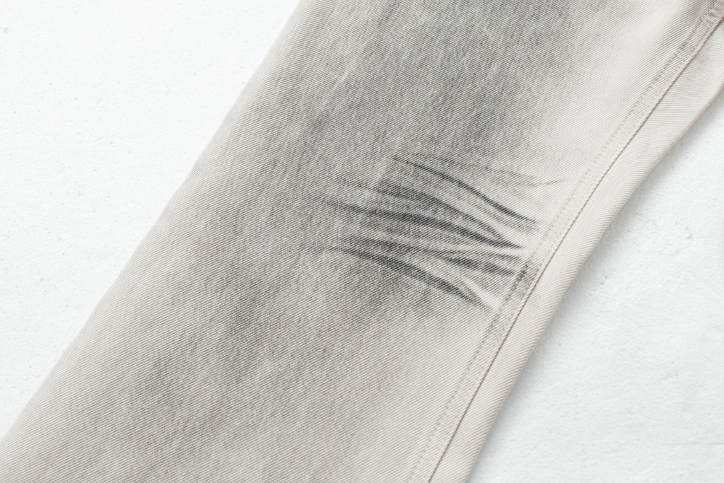 Dirty-Wash Distressed Micro-Flare Denim Jeans