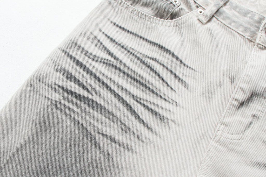Dirty-Wash Distressed Micro-Flare Denim Jeans