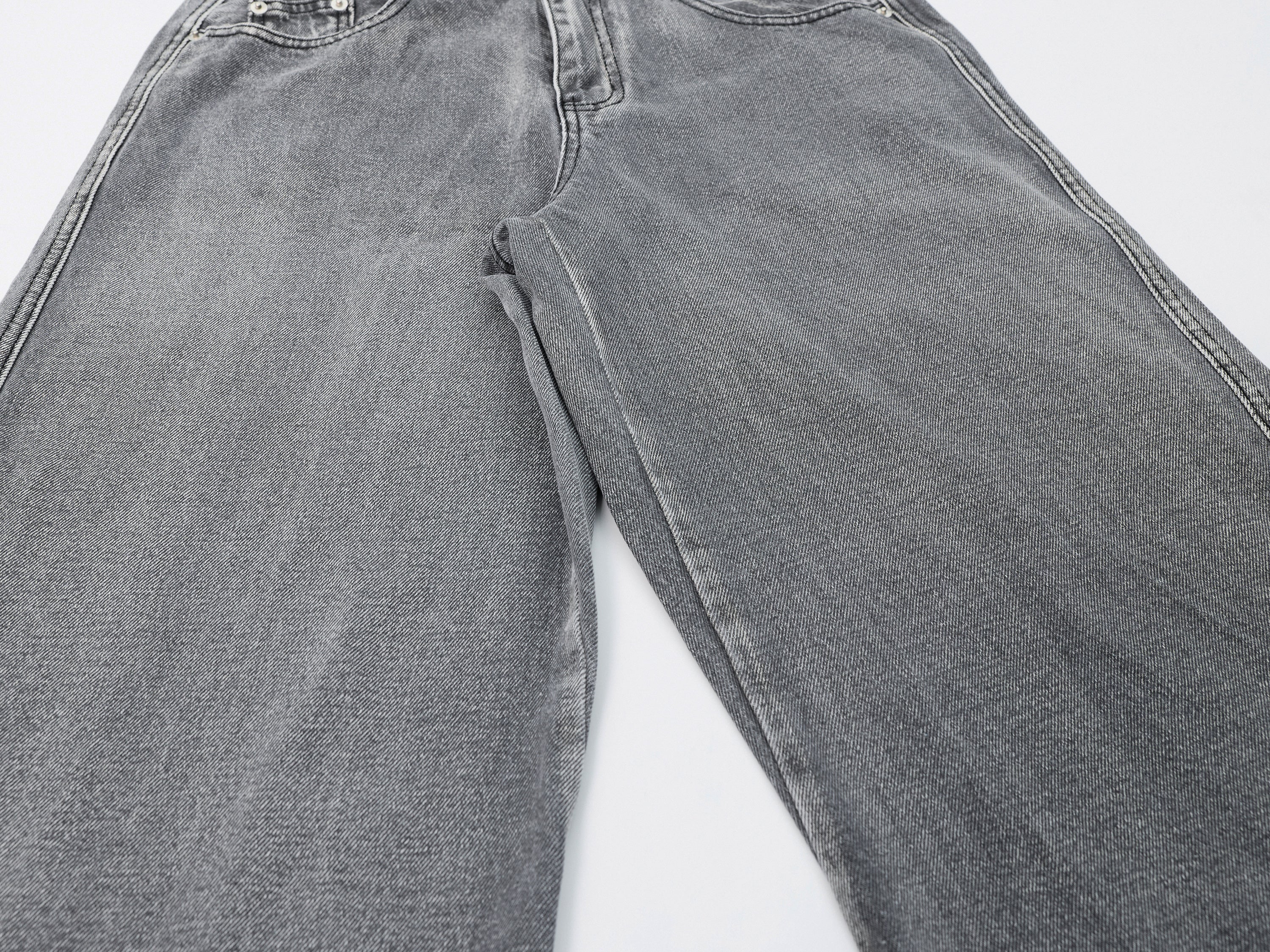 DONOTLOGO Oversized Grey Wash Denim Jeans - Unisex Baggy Trousers with Asymmetrical Seam Design - Edgy Streetwear Bottom with Wide Leg Silhouette & Raw Hem