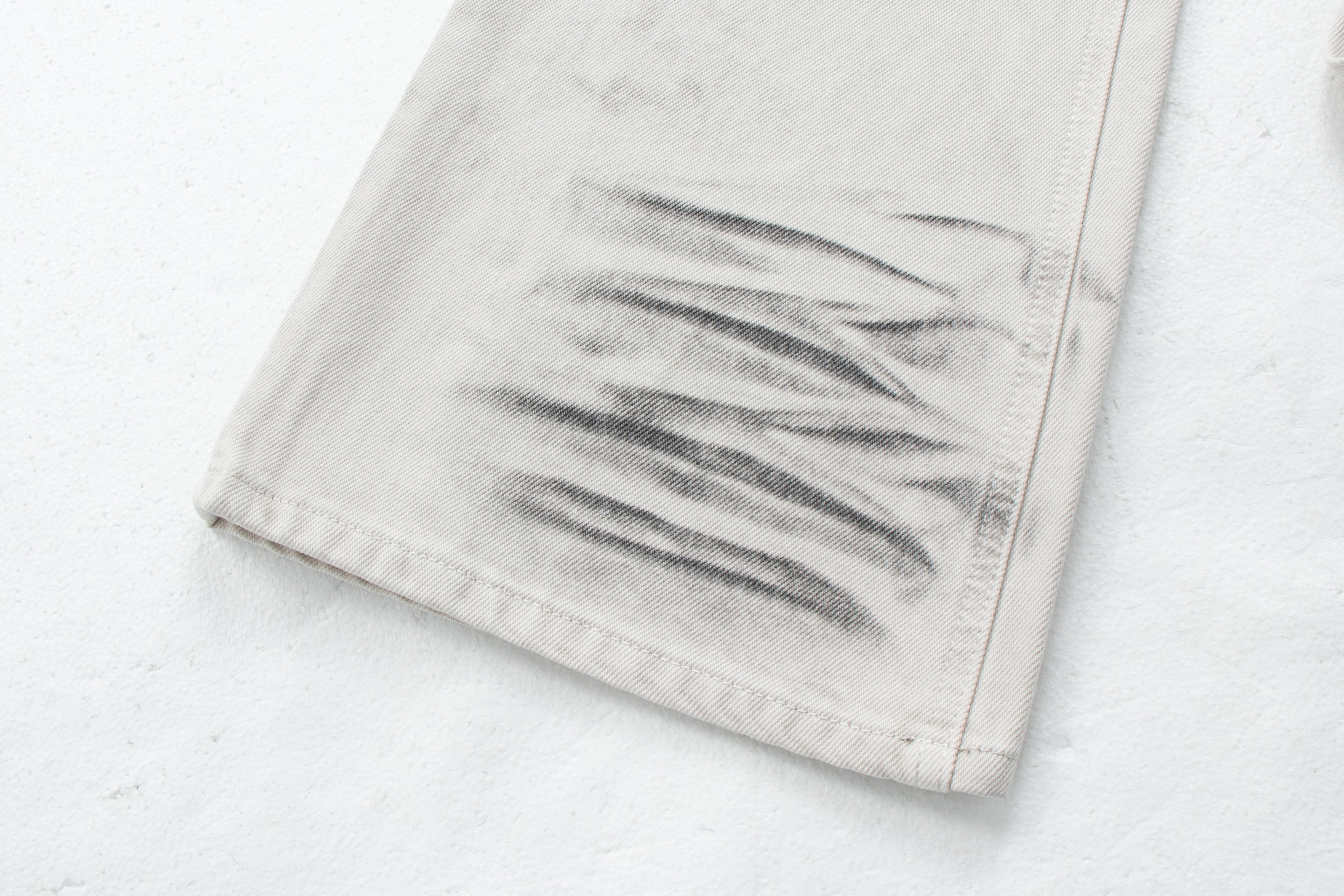 Dirty-Wash Distressed Micro-Flare Denim Jeans