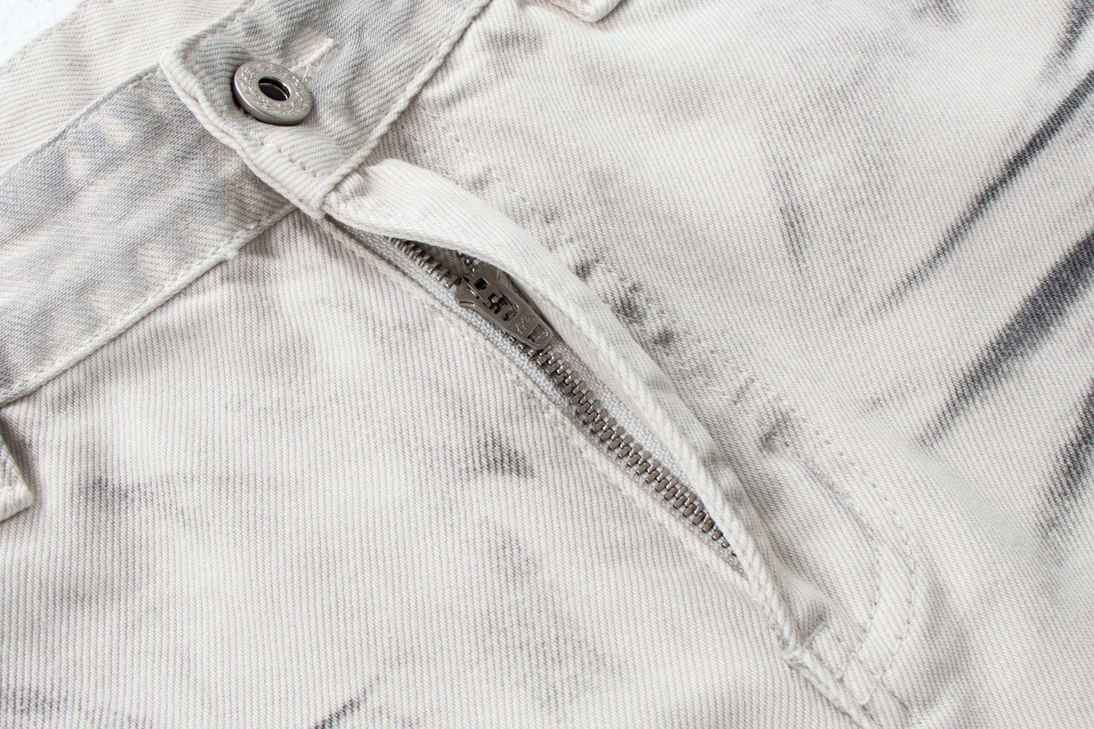 Dirty-Wash Distressed Micro-Flare Denim Jeans