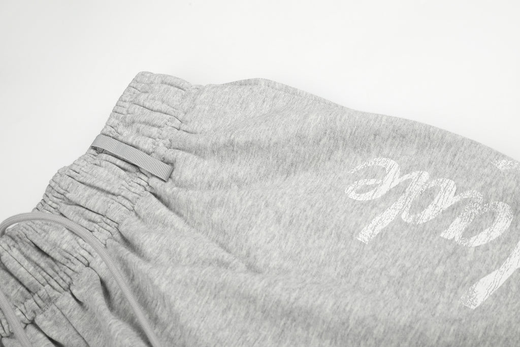 DONOTLOGO Urban Streetwear Collection | Unisex Relaxed Fit Sweatpants | Bold Script Motif & High-Waist Silhouette with Breathable Cotton Blend