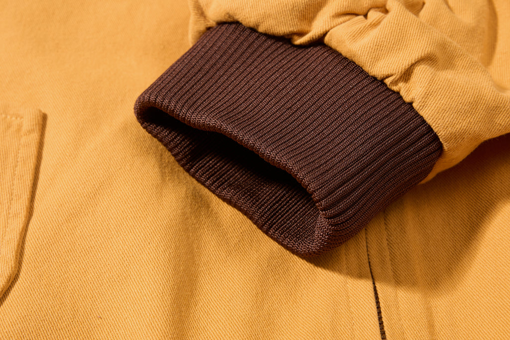 DONOTLOGO Retro Air Force Aesthetic | Unisex Heavyweight Cotton Bomber | Mustard Tone Workwear Jacket with Vintage Badge Details & Ribbed Trim