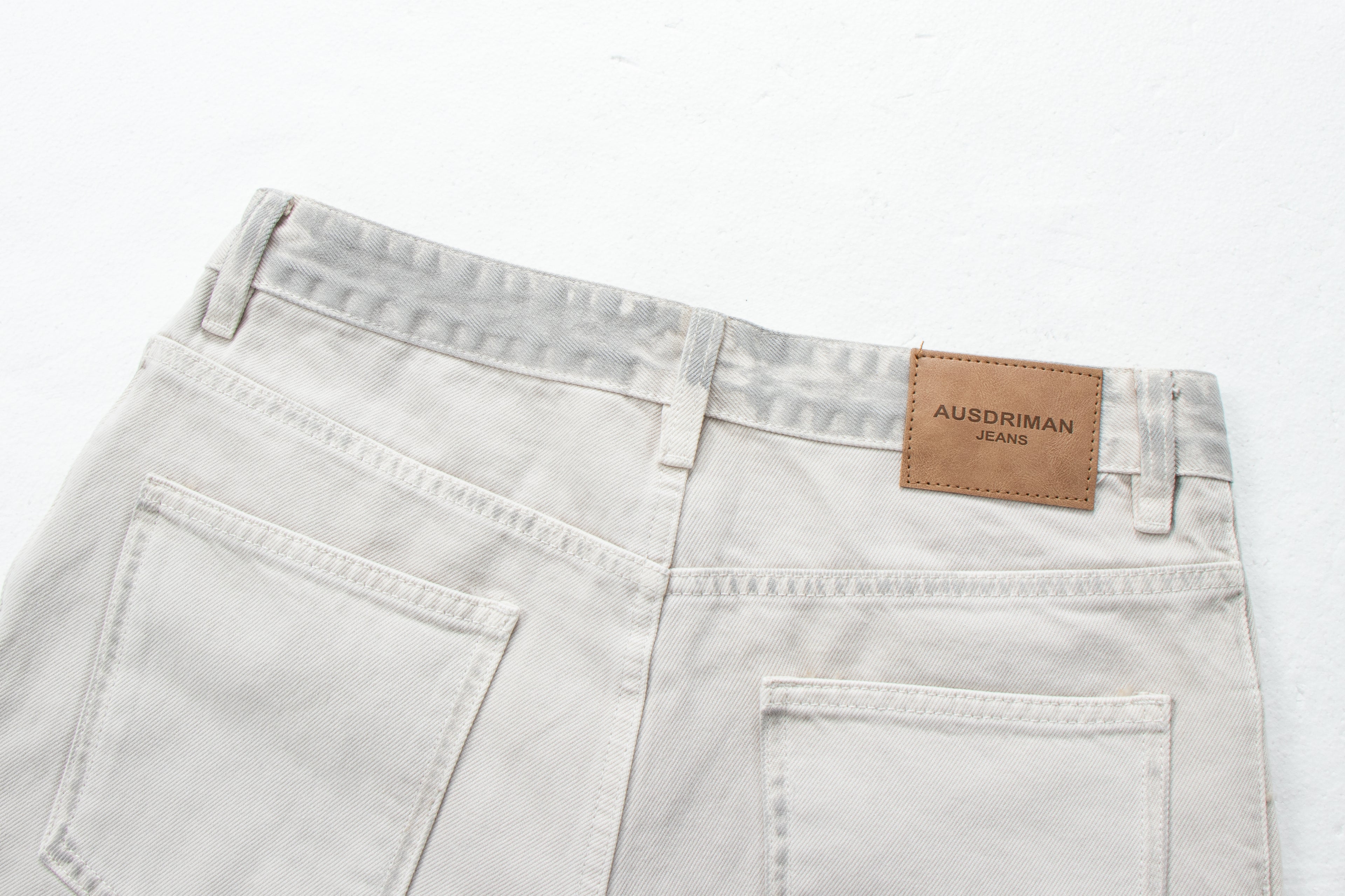 Dirty-Wash Distressed Micro-Flare Denim Jeans