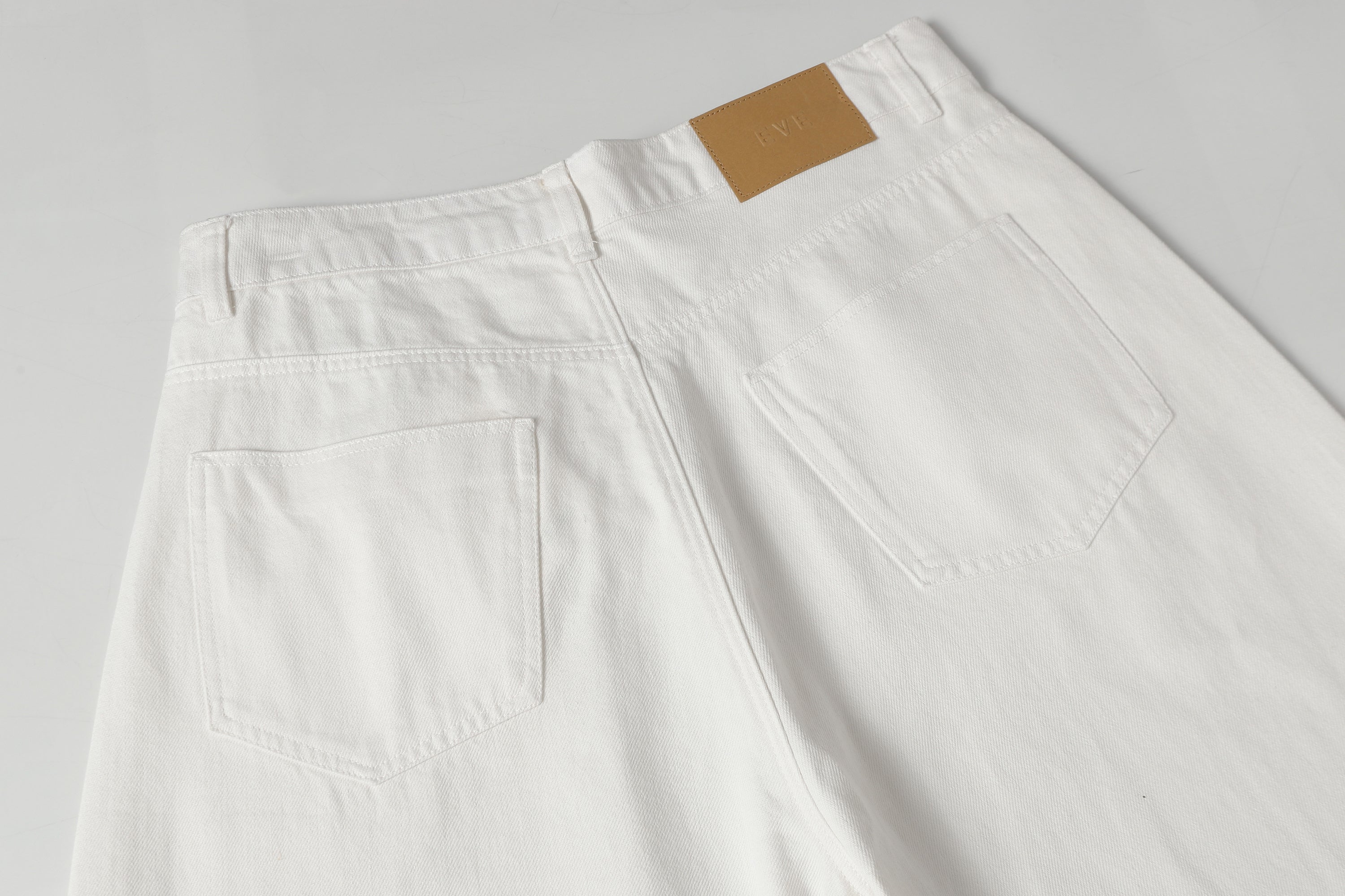 DONOTLOGO Urban Minimalist Collection | Unisex Relaxed Fit Denim Shorts | Clean White Silhouette & Leather Patch Detail with Breathable Cotton Fabric
