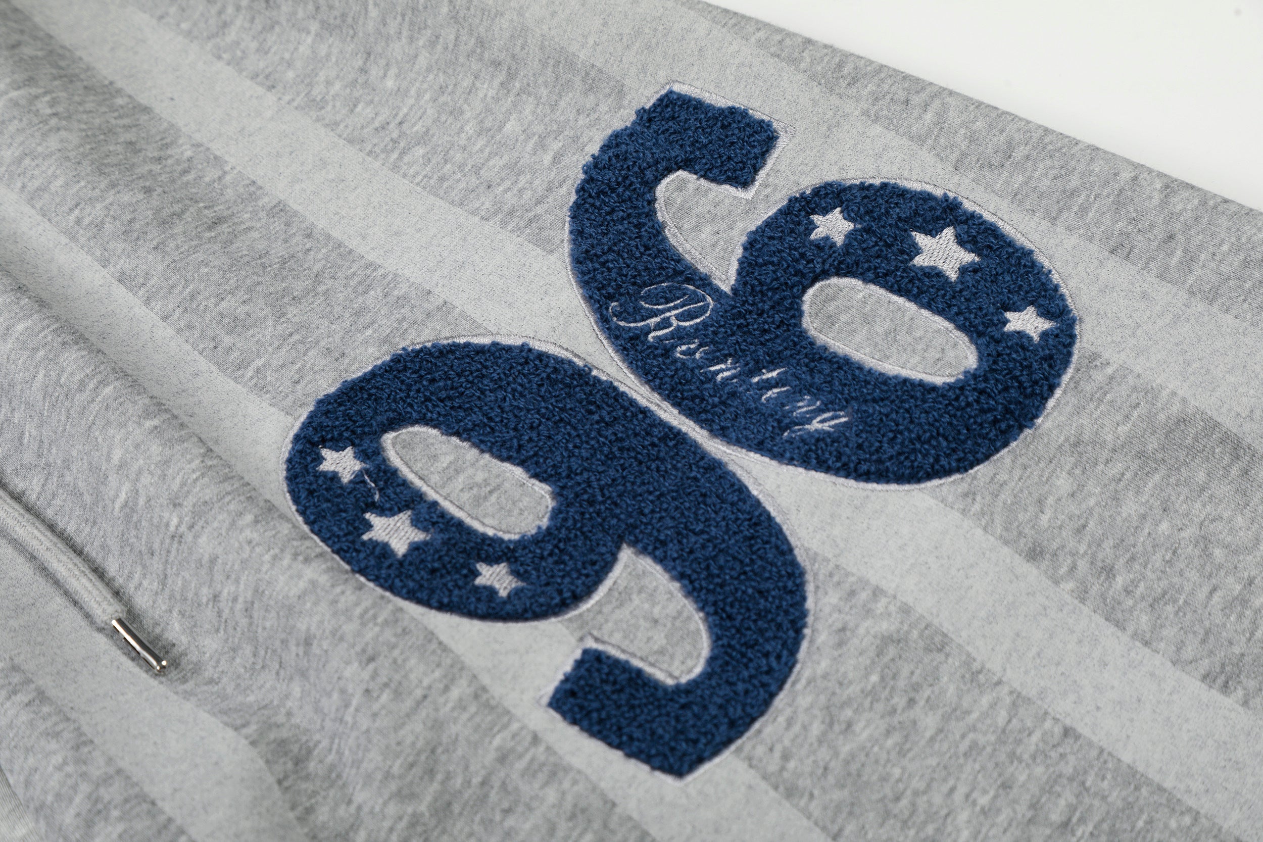 DONOTLOGO Urban Streetwear Collection | Unisex Relaxed Fit Sweatpants | Bold Star Motif & '96' Script with Asymmetric Silhouette and Breathable Fabric