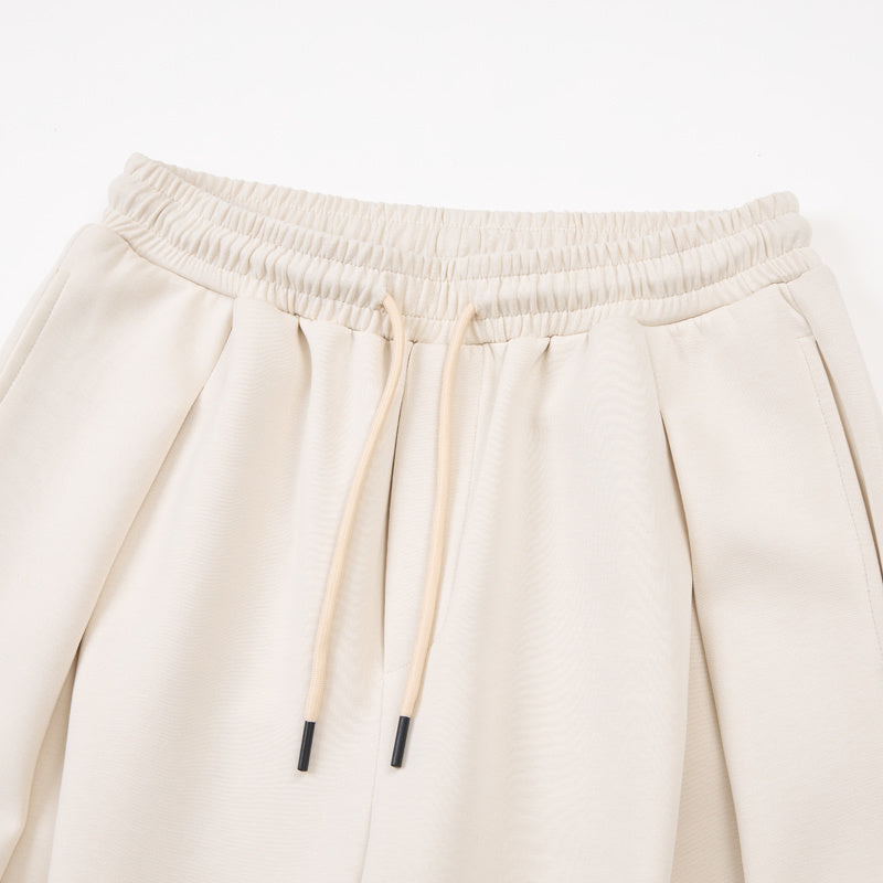 DONOTLOGO Urban Streetwear Collection | Unisex Curved Silhouette Trousers | Bold Pleat Motif & Soft Cotton Blend Fabric