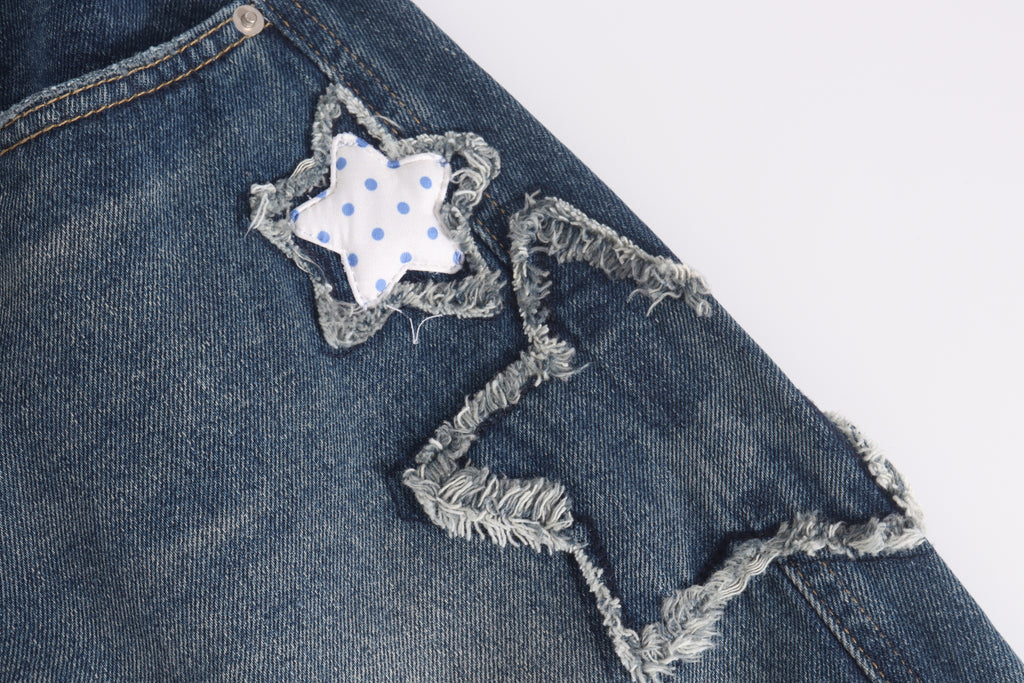 DONOTLOGO Retro Grunge Aesthetic | Unisex Baggy Star-Embellished Denim Trousers | Distressed Wash with Raw Edge Patches & Leather Brand Tag